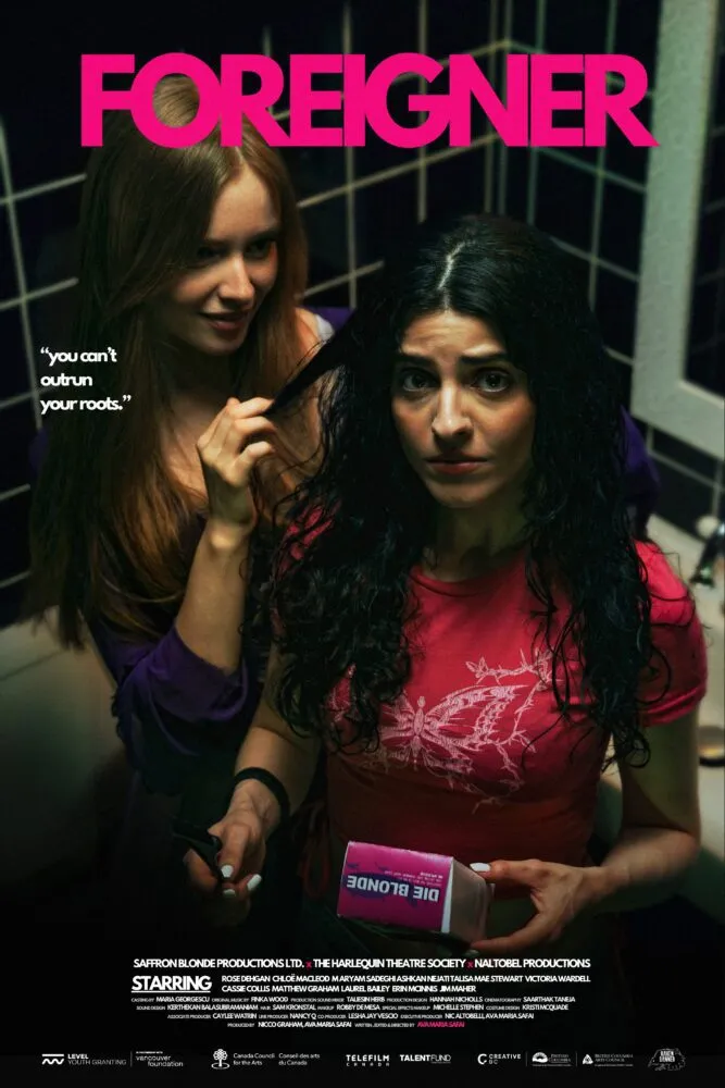 A smiling girl braids another girls hair in the bathroom on the poster for Foreigner