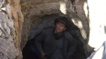 Josh Feldman pops out of an abandoned mine as he uses the metal detector.