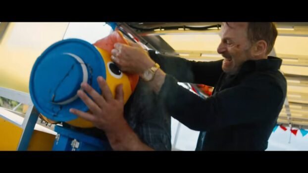 Hutch stuffs an enemies' head in a duck mask