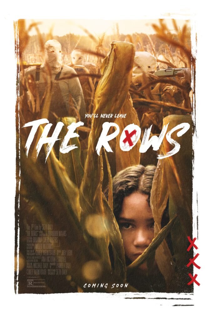 The poster for THE ROWS shows a young girl's face nestled low into corn stalks in a cornfield while slightly above her are several masked men with weapons.