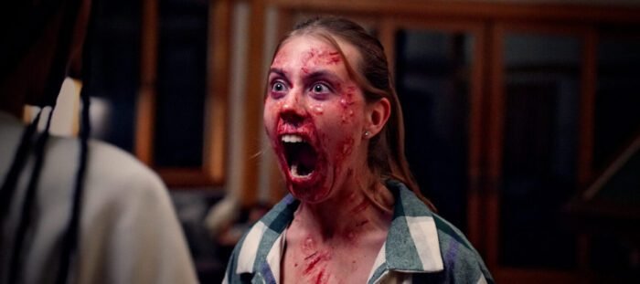 A girl is seen screaming with a rash on her face