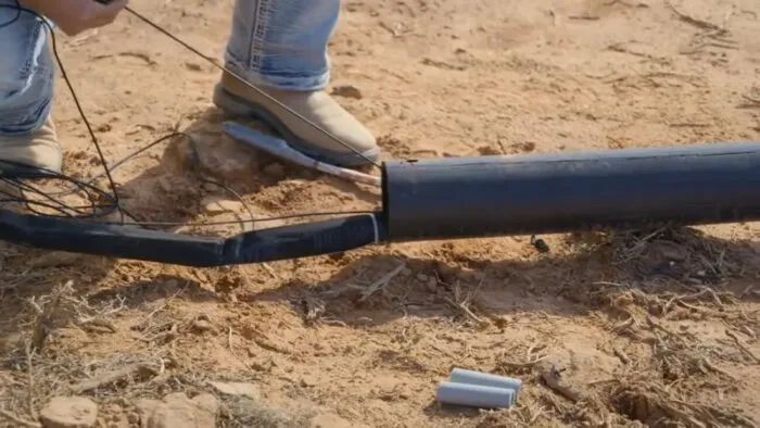 Thomas puts the GPR inside the PVC pipe