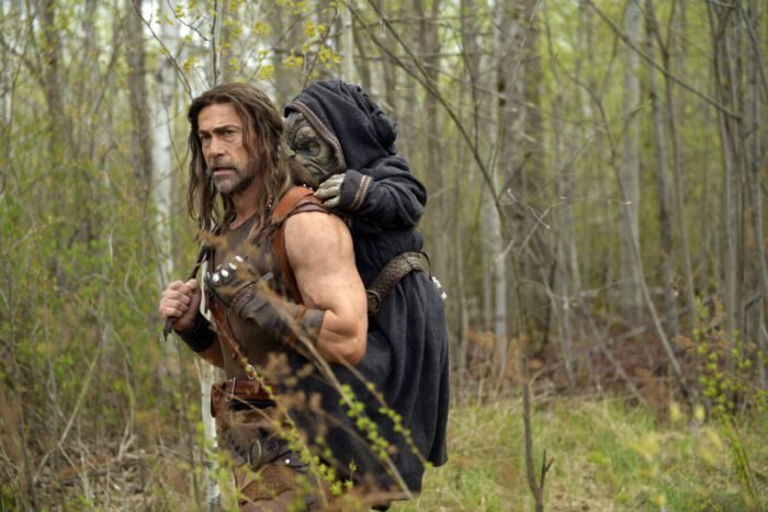 Doodad is carried by Deathstalker through the woods