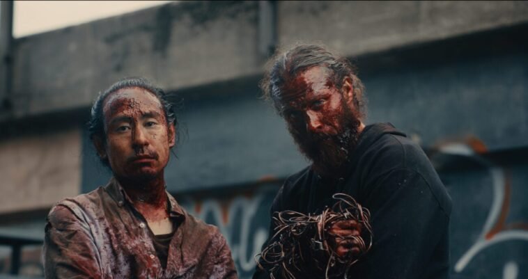 Shuhei Kinoshita as Jun and Jeffrey Decker as Teddy in Syphon