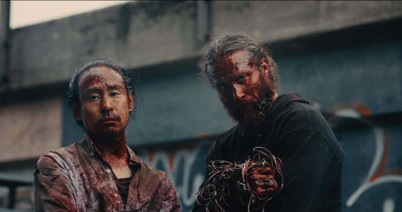 Shuhei Kinoshita as Jun and Jeffrey Decker as Teddy in Syphon