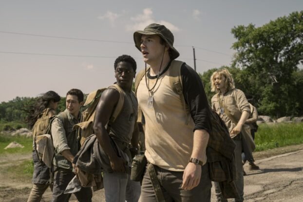 Ray and Peter and the rest of the boys are centered in the middle of the frame, looking foward in shock.