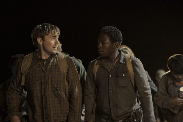 Ray and McVries talk to each other in the dead of the night as they walk.
