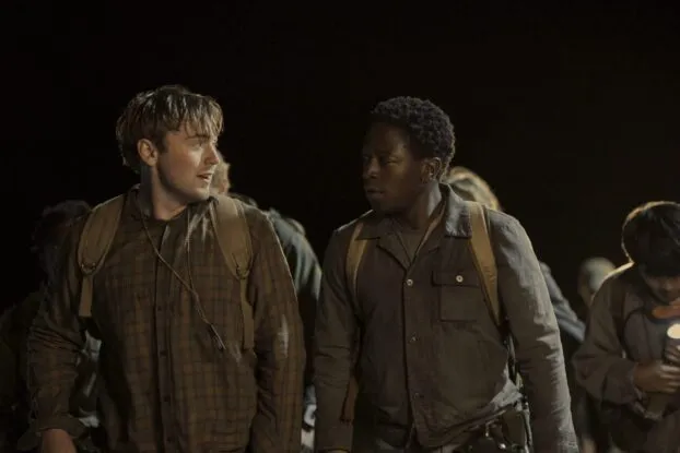 Ray and McVries talk to each other in the dead of the night as they walk.