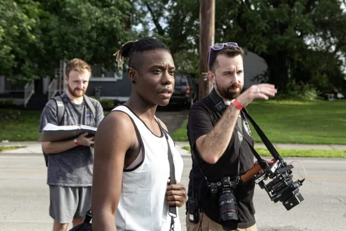 Remington Smith with Adama Adamson and crew behind the scenes of Landlord