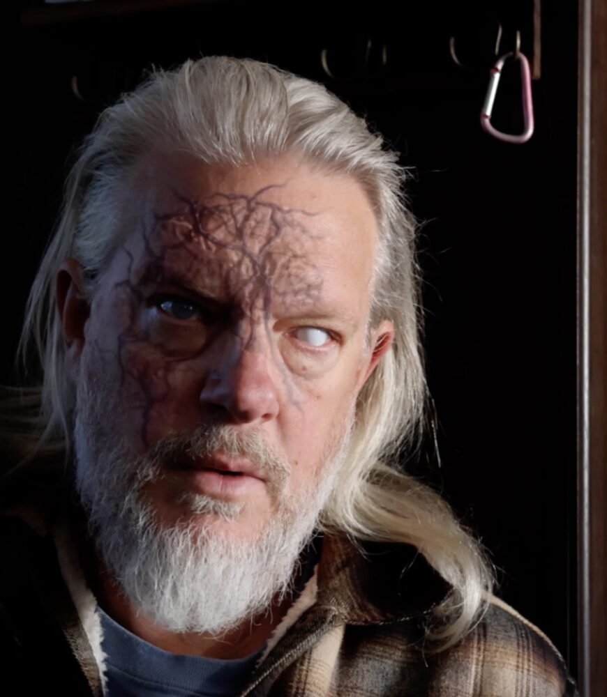 Dan Asma as Devin, feeling the effect in Tribe