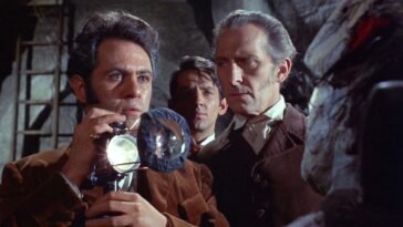 Three men stand with a bright light in The Evil of Frankenstein