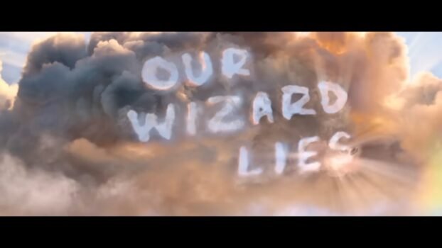 Dlphaba writes in the clouds the message: "Our Wizard Lies."