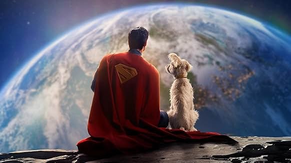 Superman sits next to Krypto the Superdog on an asteroid or the moon, looking at Earth.